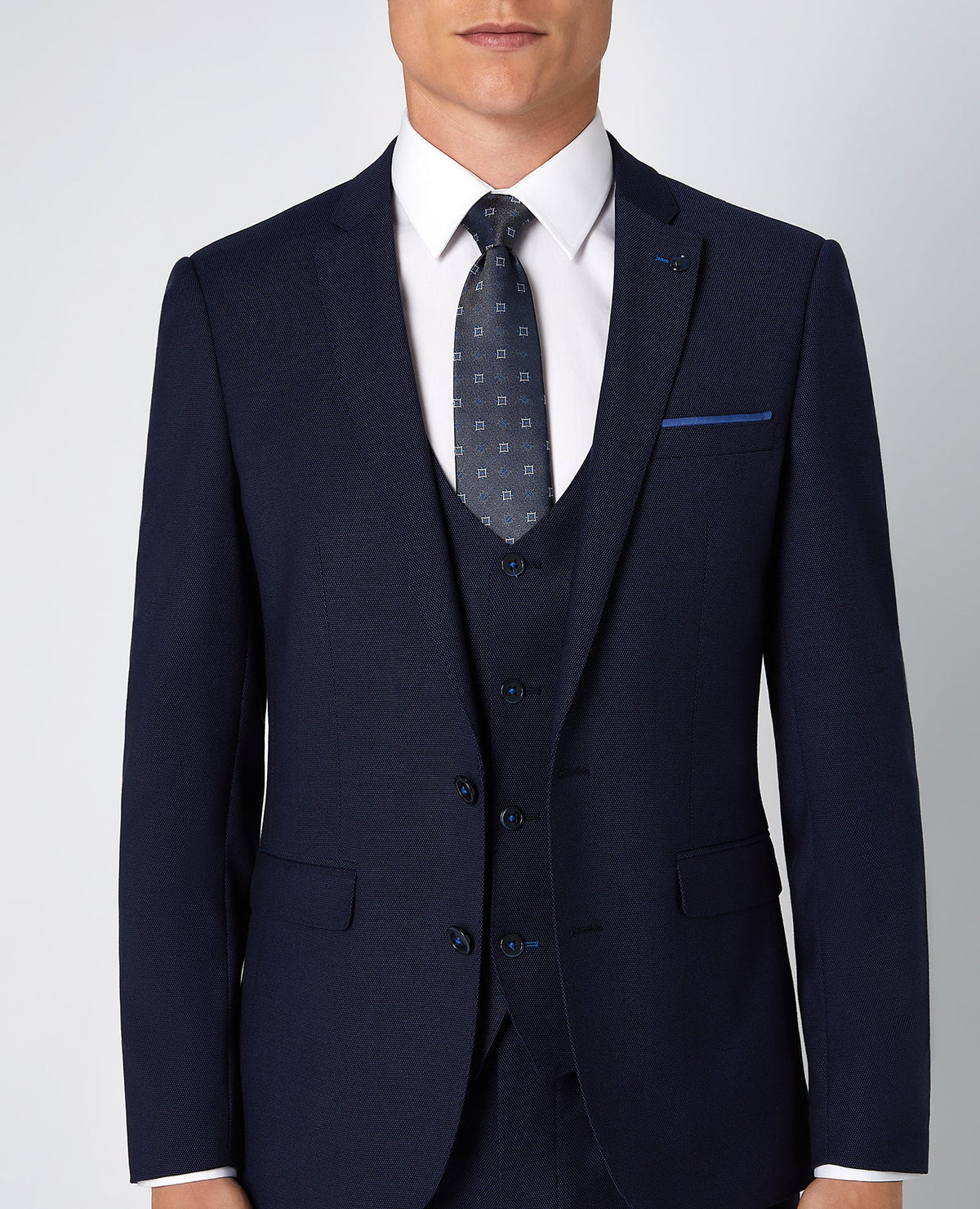 Man wearing a blue X-Slim Fit Stretch 3 Piece Suit