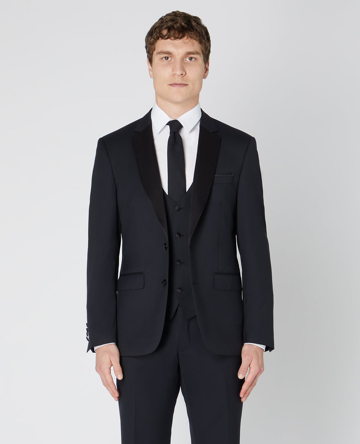 Man wearing a black Tapered Wool-Rich Mix and Match Suit Jacket