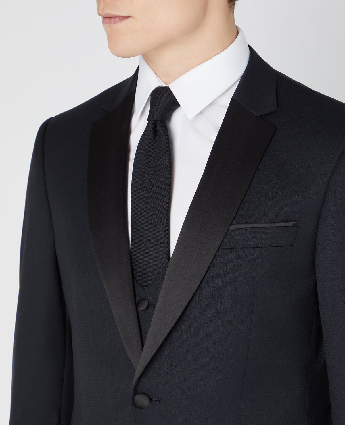 Man wearing a black Tapered Wool-Rich Mix and Match Suit Jacket