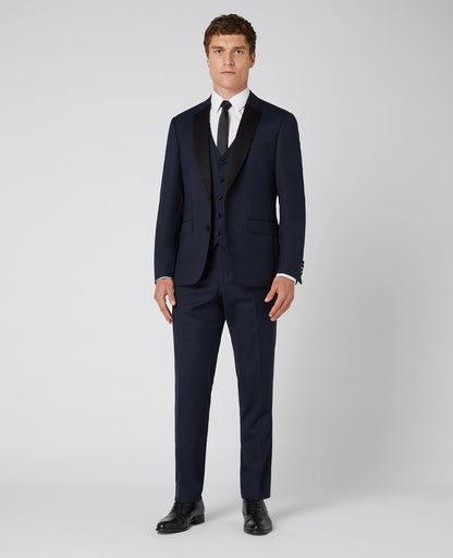 Man wearing a navy Tapered Wool-Rich Mix and Match Suit Jacket