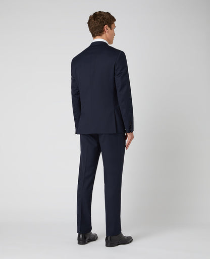 Man wearing a navy Tapered Wool-Rich Mix and Match Suit Jacket
