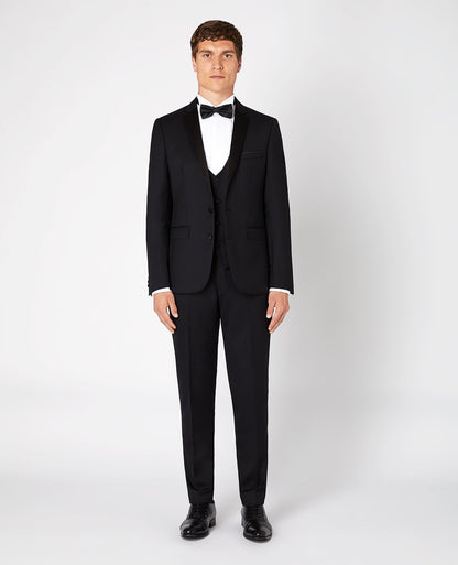 Man wearing a black Slim Fit Wool-Rich Mix and Match Dinner Suit Jacket