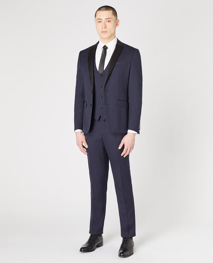 Man wearing a navy Slim Fit Wool-Rich Mix and Match Dinner Suit Jacket