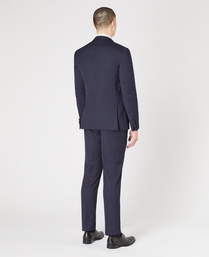 Man wearing a navy Slim Fit Wool-Rich Mix and Match Dinner Suit Jacket