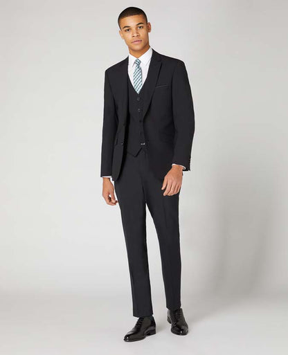 Man wearing a black Tapered Fit Wool-Blend Stretch Mix and Match Suit