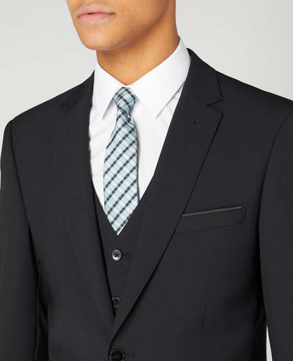 Man wearing a black Tapered Fit Wool-Blend Stretch Mix and Match Suit