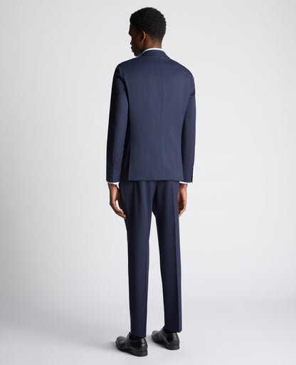 Man wearing a navy Slim Fit Wool-Rich Mix and Match Suit