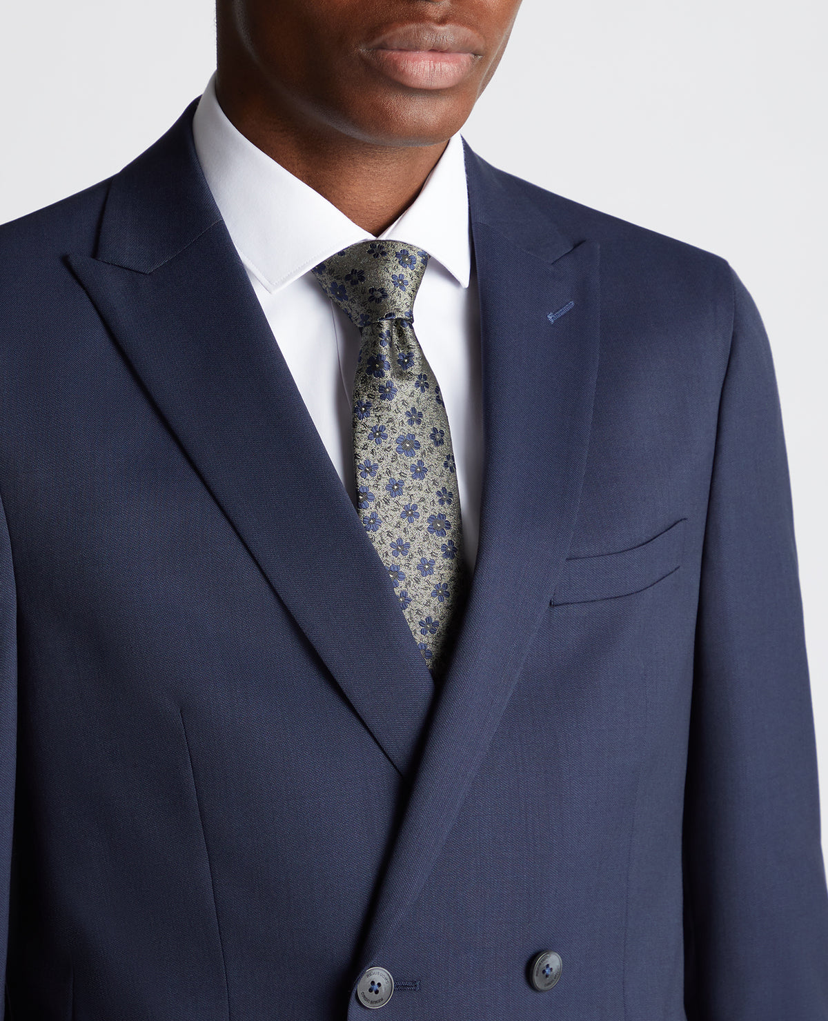 Man wearing a navy Slim Fit Wool-Rich Mix and Match Suit