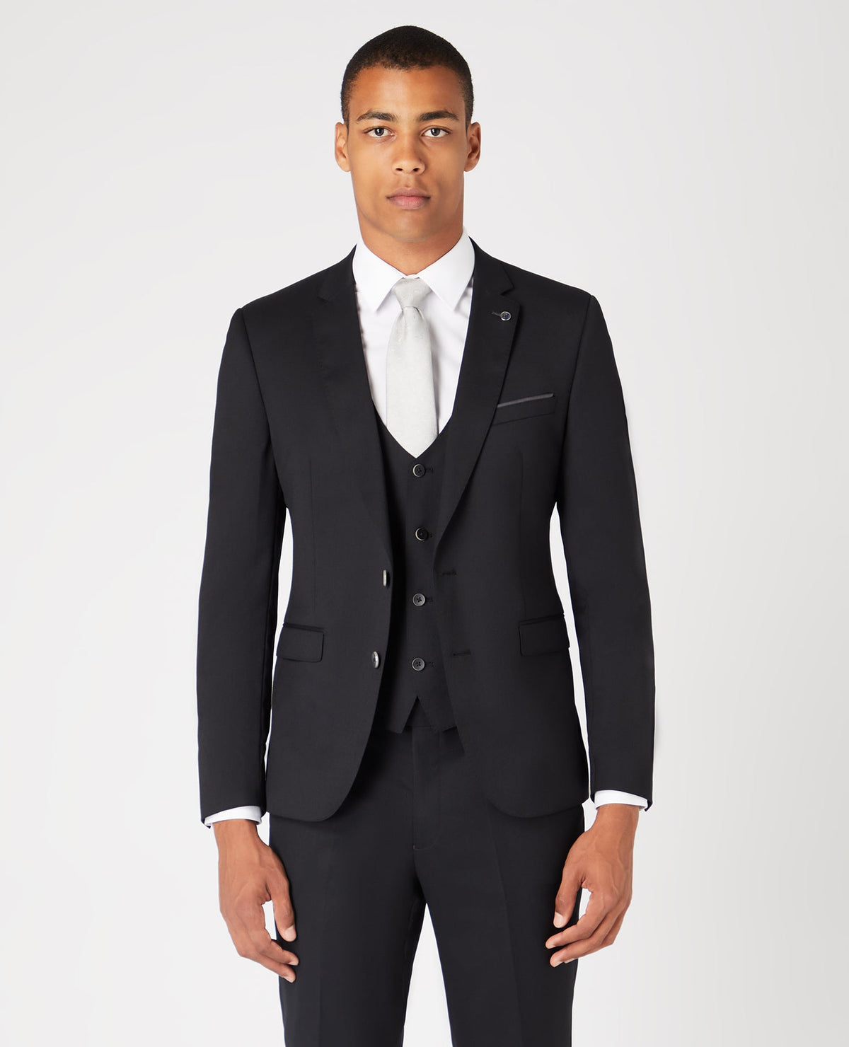 Man wearing a black Slim Fit Wool-Rich Mix and Match Suit Jacket