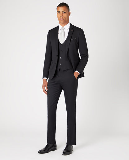 Man wearing a black Slim Fit Wool-Rich Mix and Match Suit Jacket