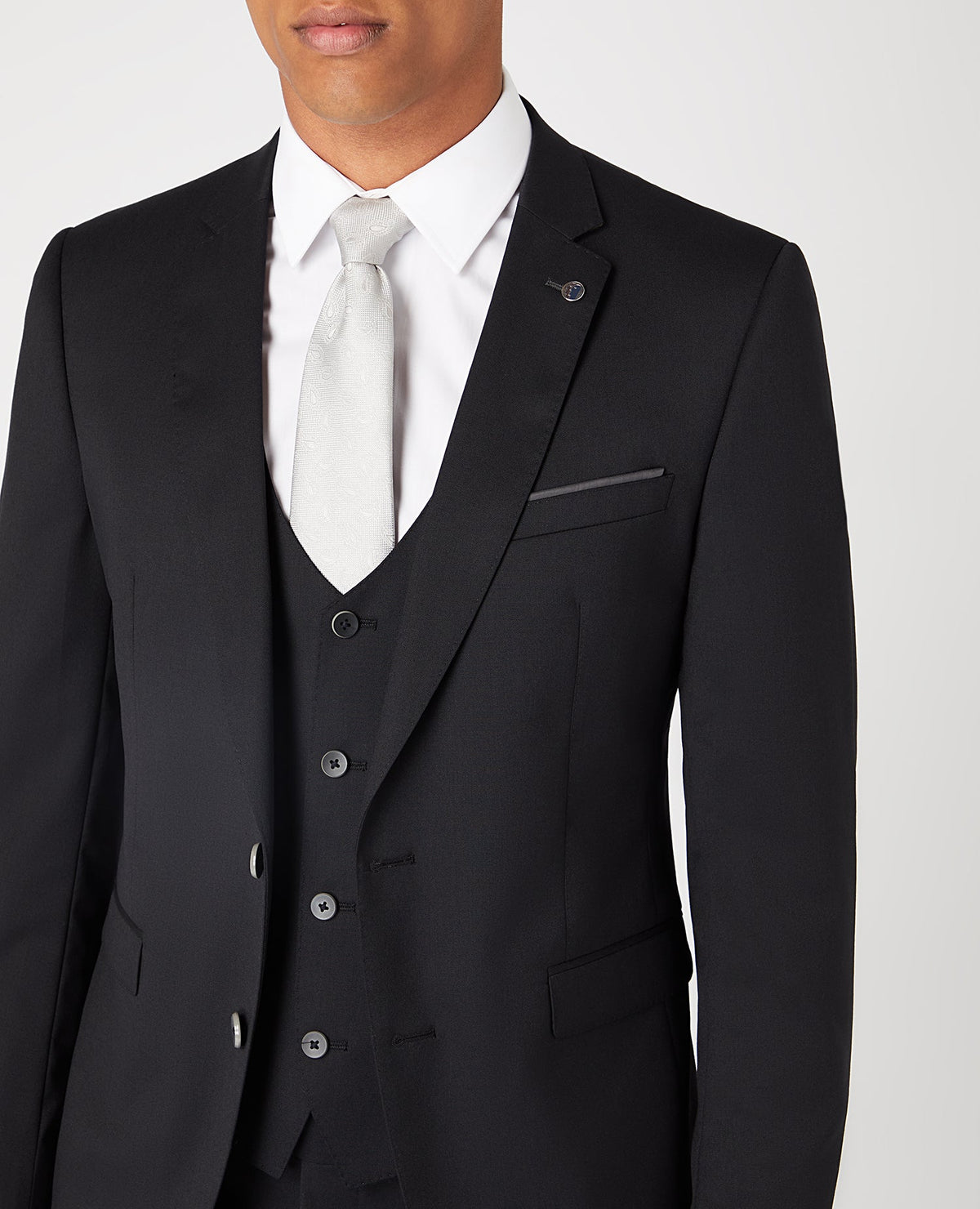 Man wearing a black Slim Fit Wool-Rich Mix and Match Suit Jacket
