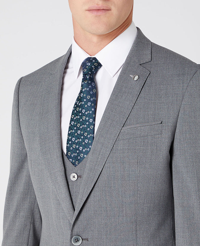 Man wearing a grey Slim Fit Wool-Blend Stretch Mix and Match Suit Jacket