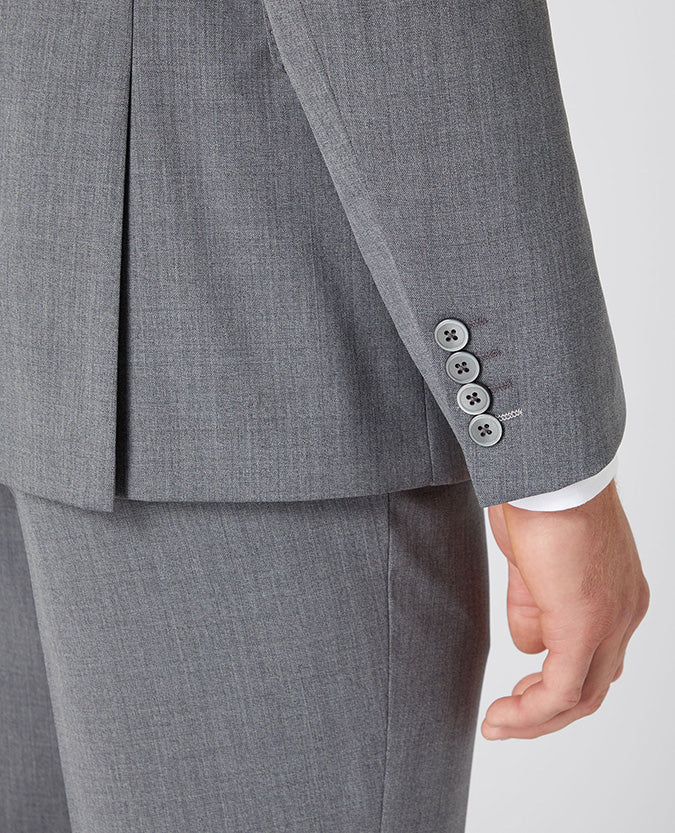 Man wearing a grey Slim Fit Wool-Blend Stretch Mix and Match Suit Jacket