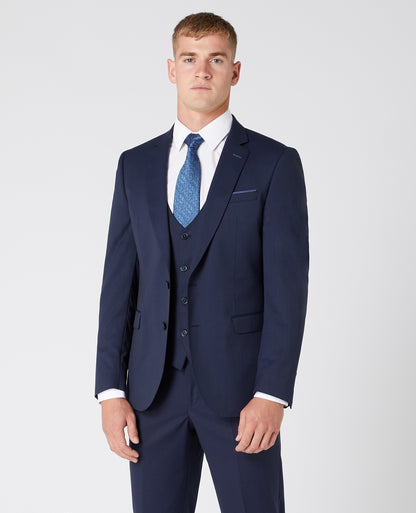 Man wearing a navy Slim Fit Wool-Rich Mix and Match Suit