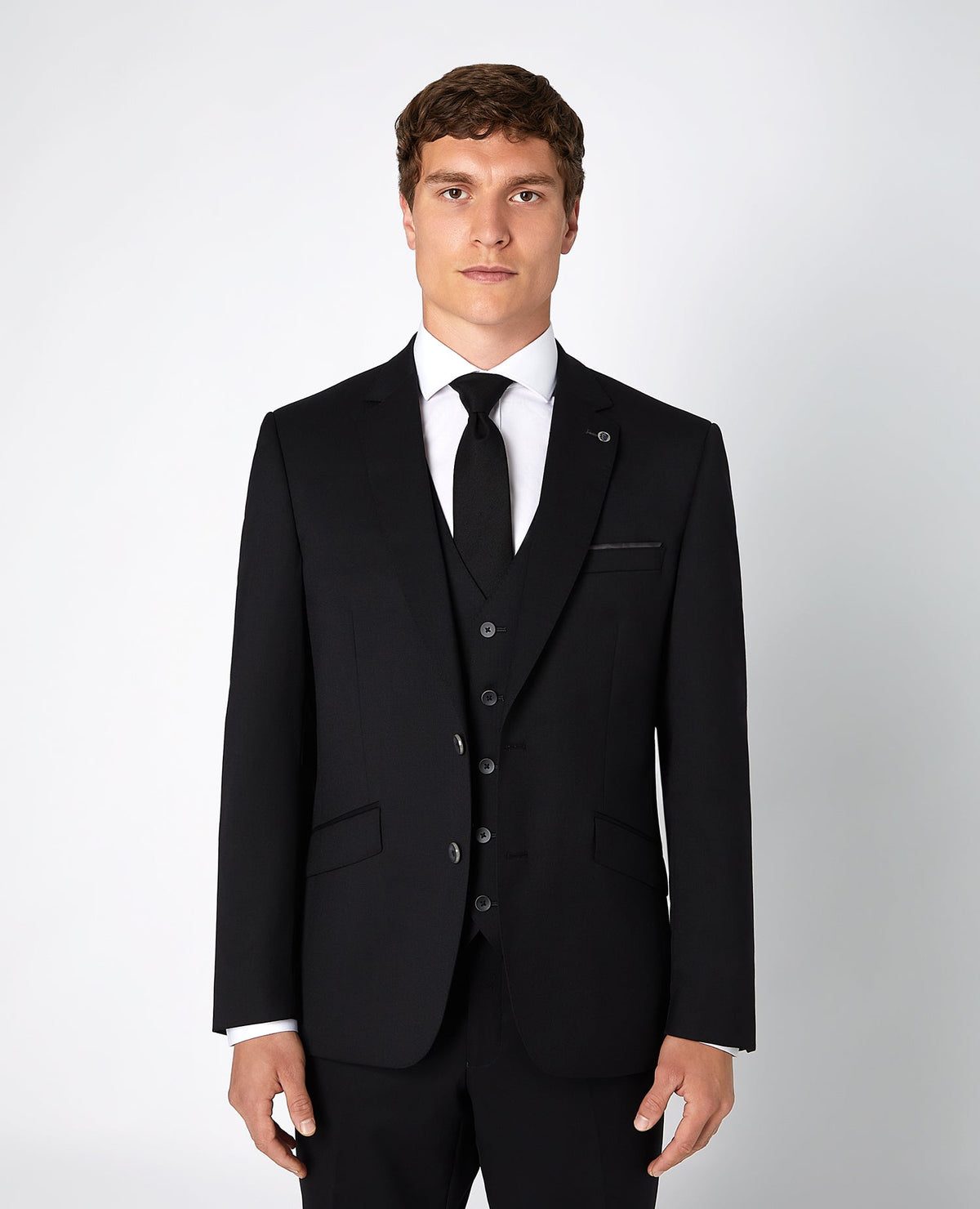 Man wearing a black Tapered Fit Wool-Blend Mix and Match Suit Jacket