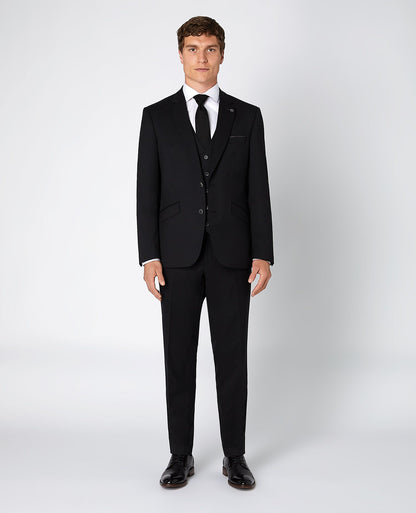 Man wearing a black Tapered Fit Wool-Blend Mix and Match Suit Jacket