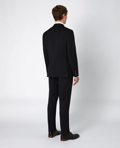 Man wearing a black Tapered Fit Wool-Blend Mix and Match Suit Jacket