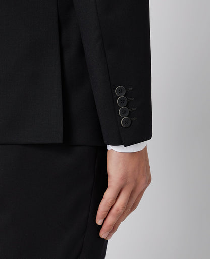 Man wearing a black Tapered Fit Wool-Blend Mix and Match Suit Jacket