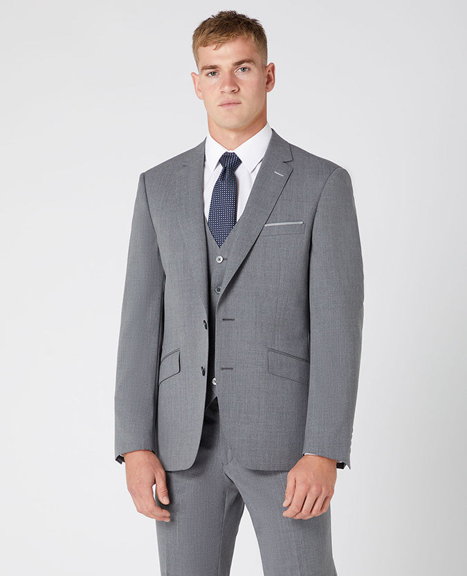 Man wearing a grey Tapered Fit Wool-Blend Stretch Mix and Match Suit