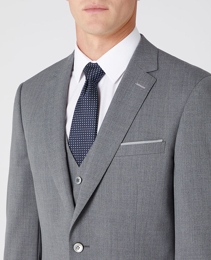 Man wearing a grey Tapered Fit Wool-Blend Stretch Mix and Match Suit