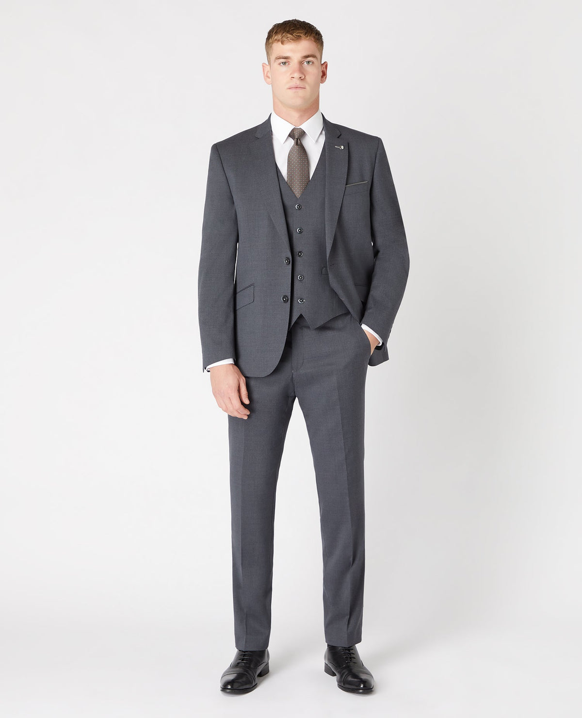 Man wearing a grey Tapered Fit Wool-Blend Mix and Match Suit