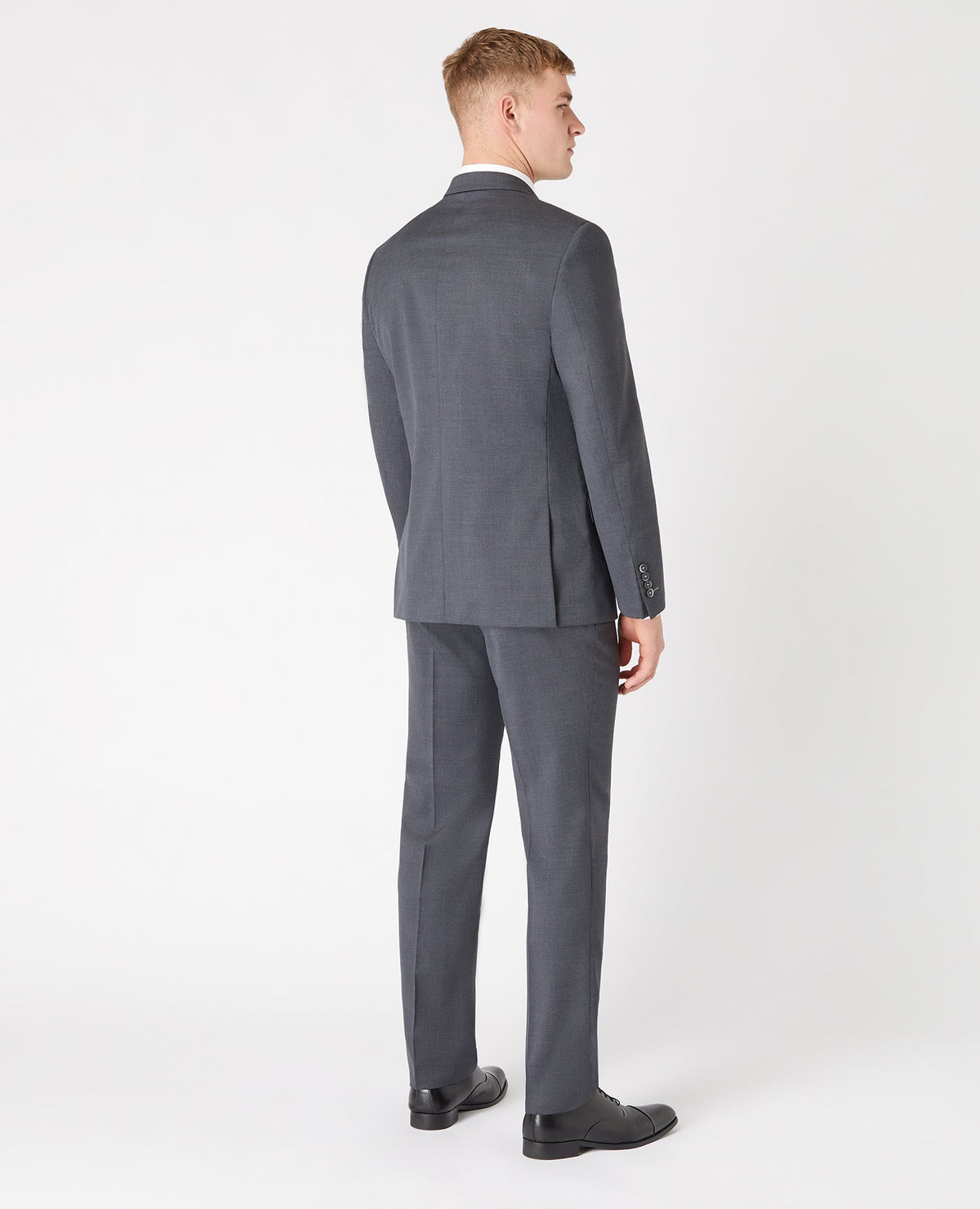 Man wearing a grey Tapered Fit Wool-Blend Mix and Match Suit