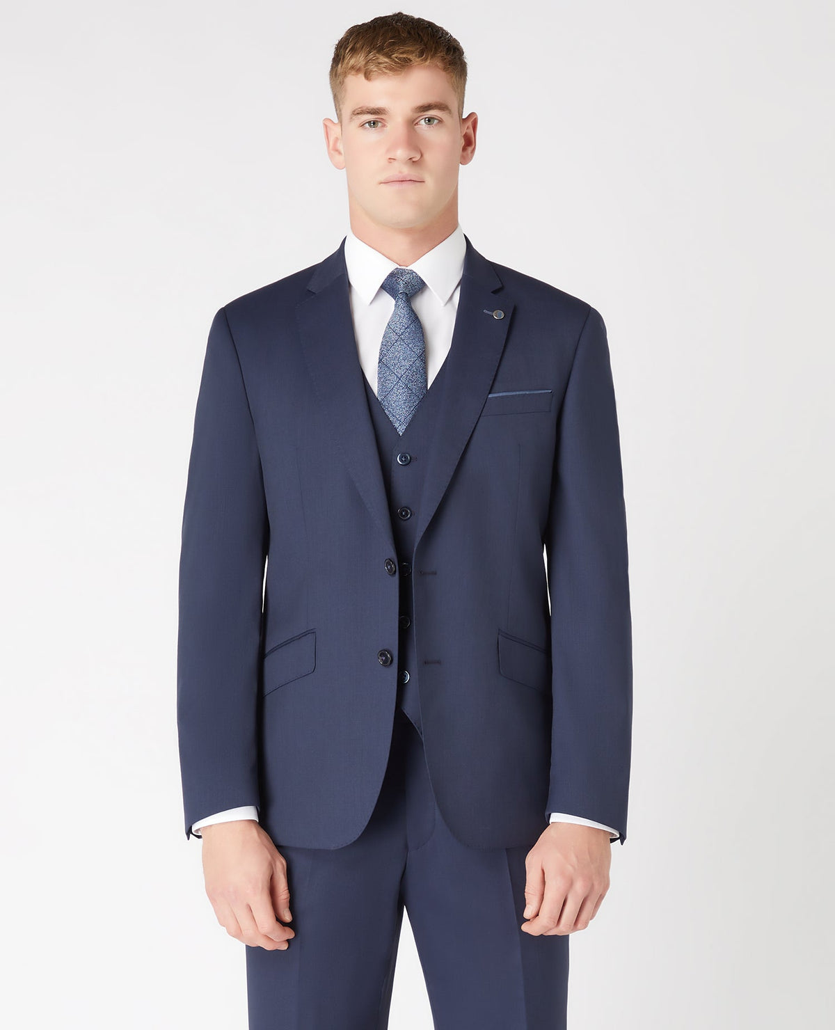 Man wearing a navy Tapered Fit Wool-Blend Mix and Match Suit