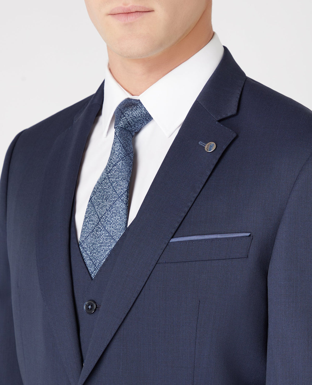 Man wearing a navy Tapered Fit Wool-Blend Mix and Match Suit