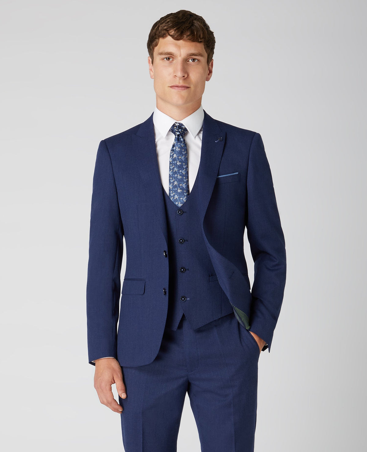 Man wearing a blue X-Slim Fit Wool Rich Mix and Match Suit