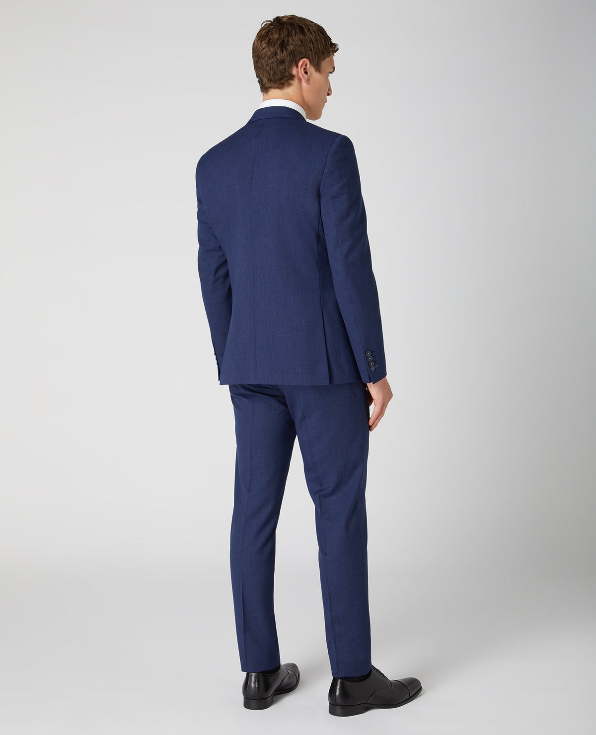 Man wearing a blue X-Slim Fit Wool Rich Mix and Match Suit
