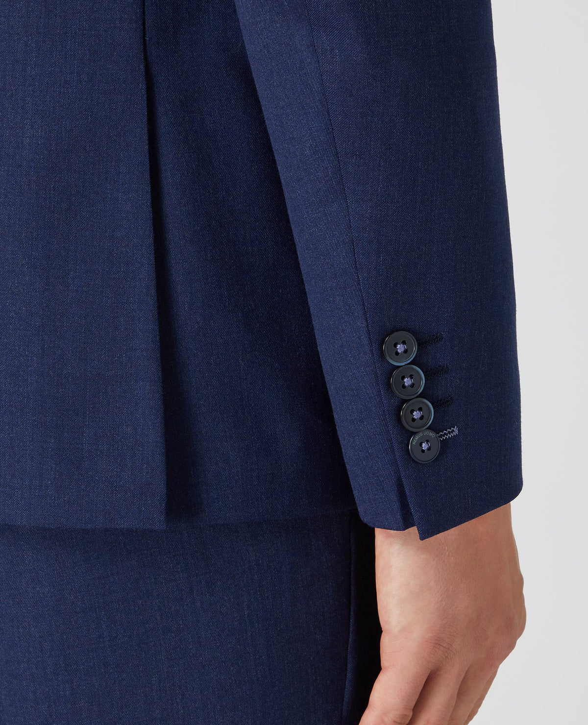 Man wearing a blue X-Slim Fit Wool Rich Mix and Match Suit