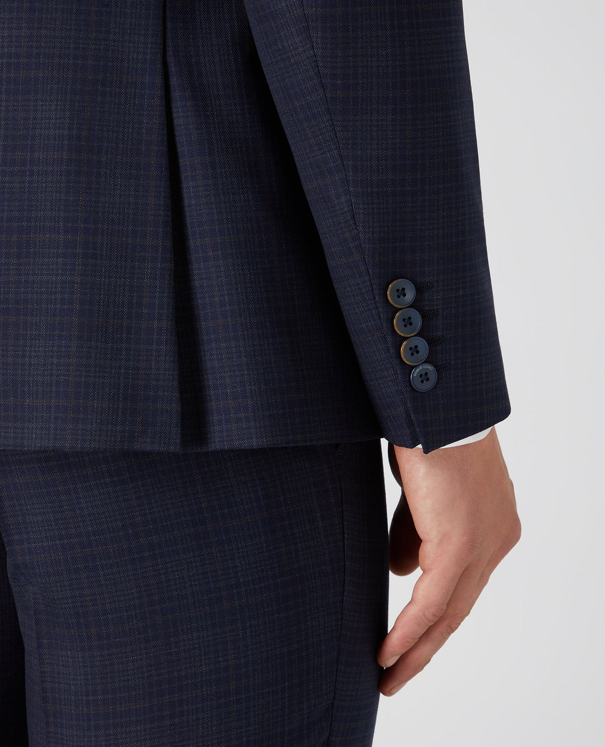 Man wearing a navy X-Slim Fit Checked Wool-Rich Mix and Match Suit.