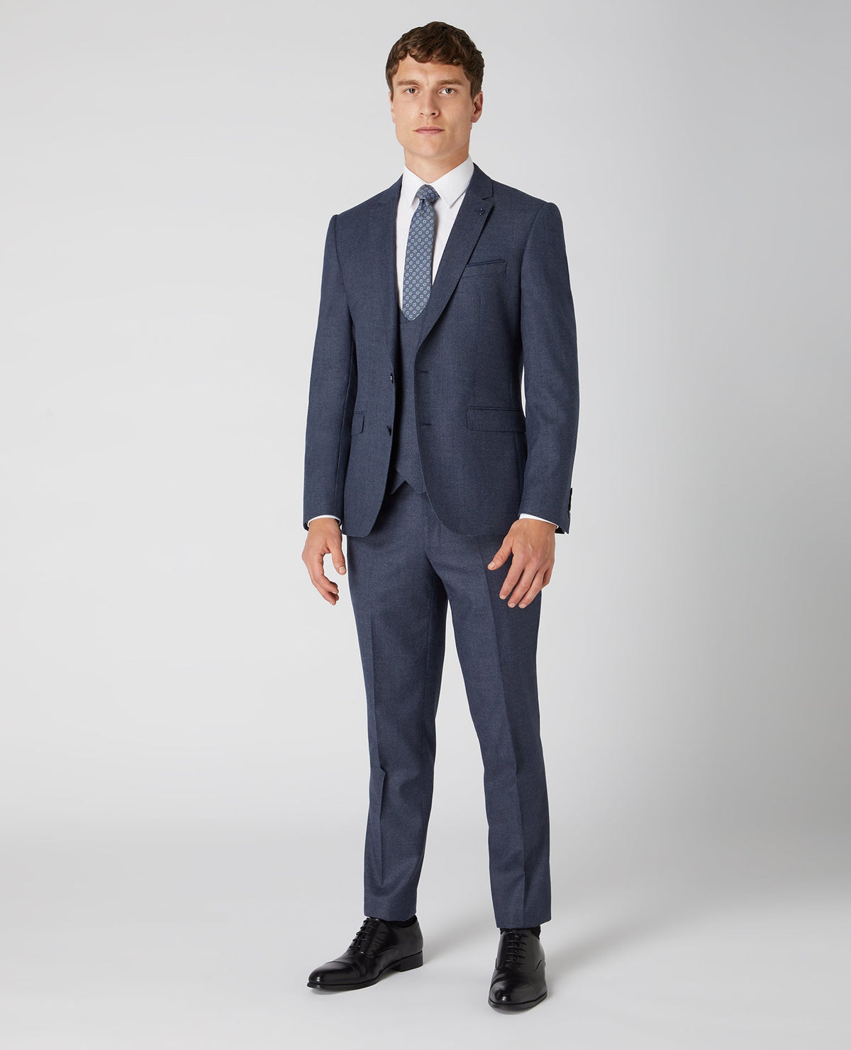 Man wearing a grey X-slim Fit Wool Rich Mix and Match Suit