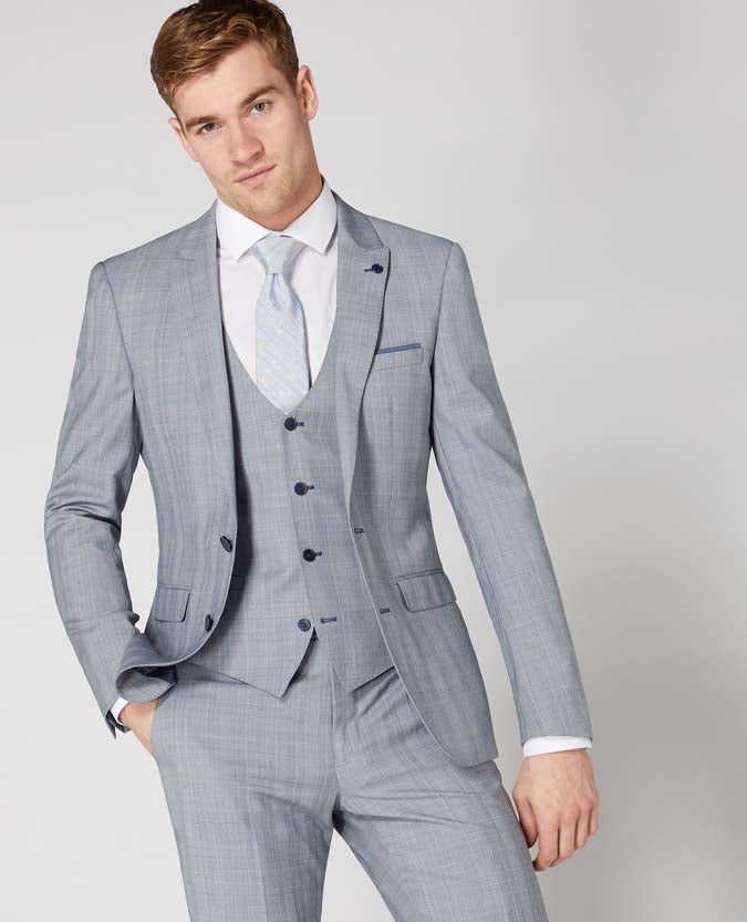 Man wearing a blue X-Slim Fit Wool-Rich Mix and Match Suit