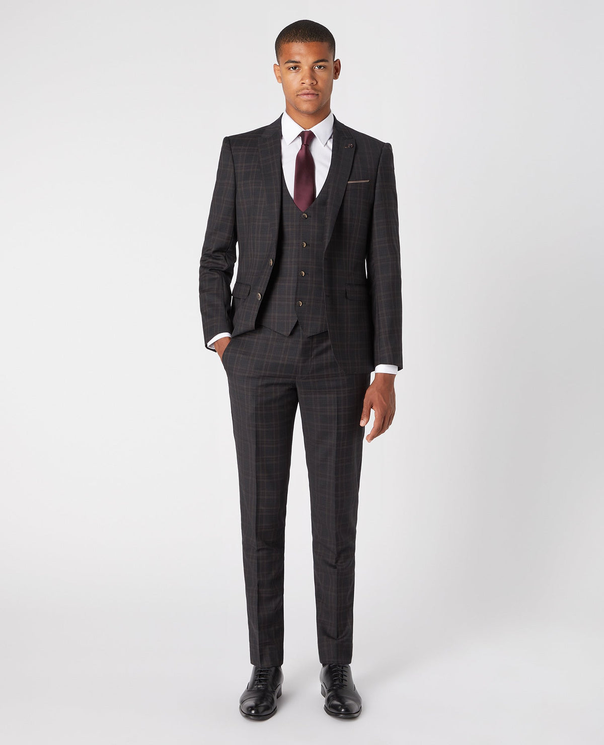 Man wearing a grey X-Slim Fit Checked Wool-Rich Stretch Mix And Match Suit