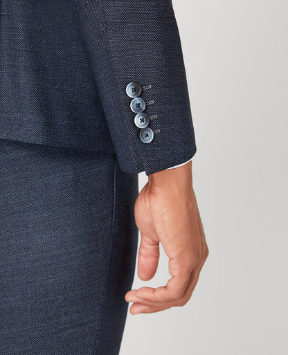 Man wearing a blue Slim Fit Wool-Rich Mix and Match Suit