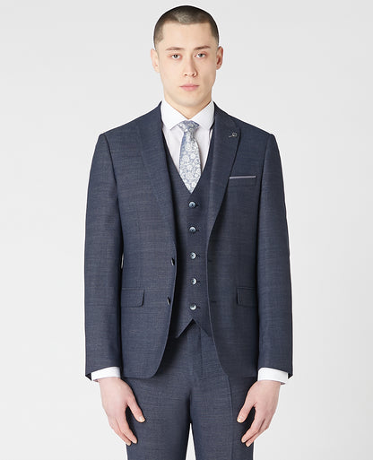 Man wearing a blue Tapered Fit Wool-Rich Stretch Mix and Match Suit Jacket