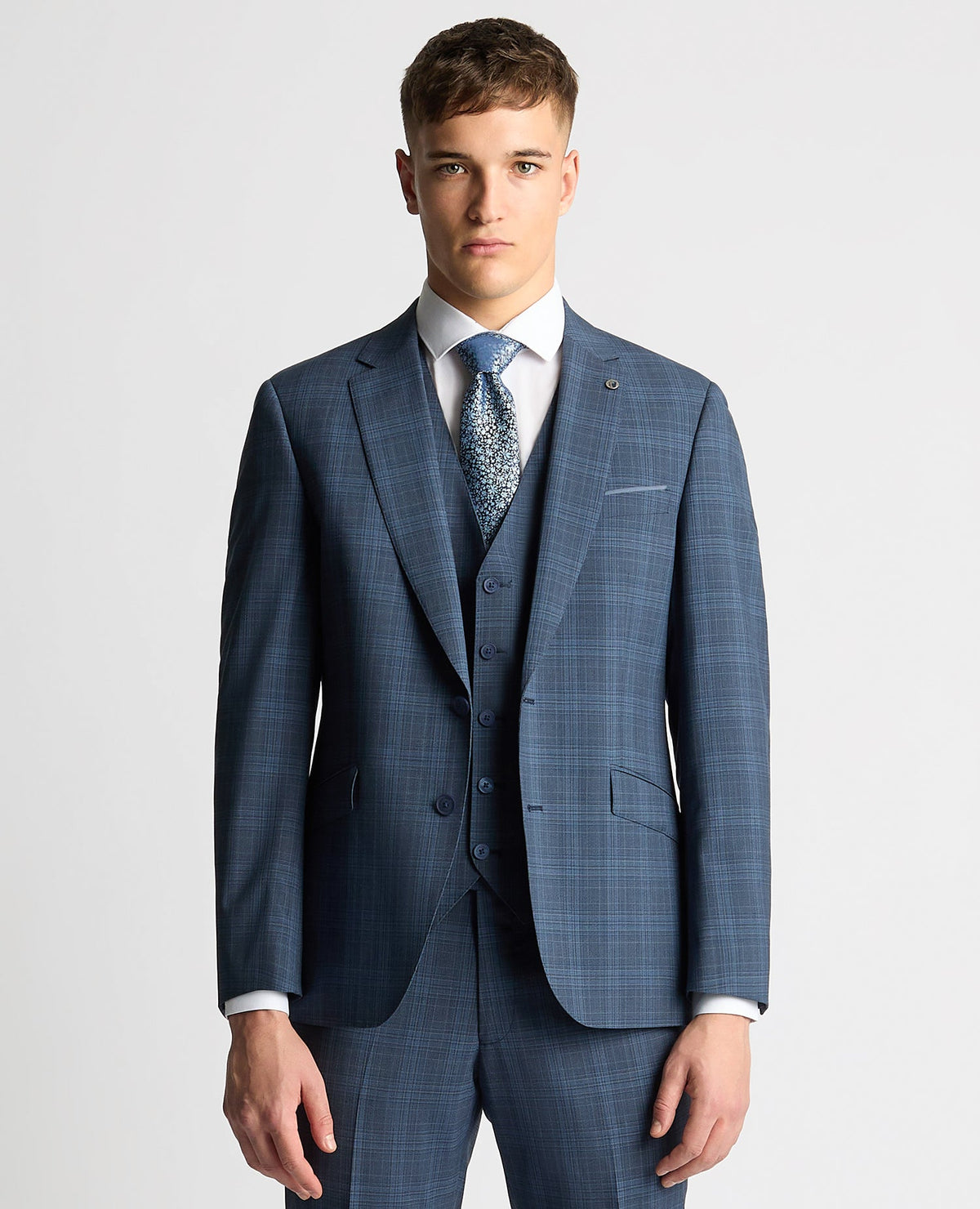 Man wearing a blue Tapered Fit Checked Wool Blend Mix and Match Suit
