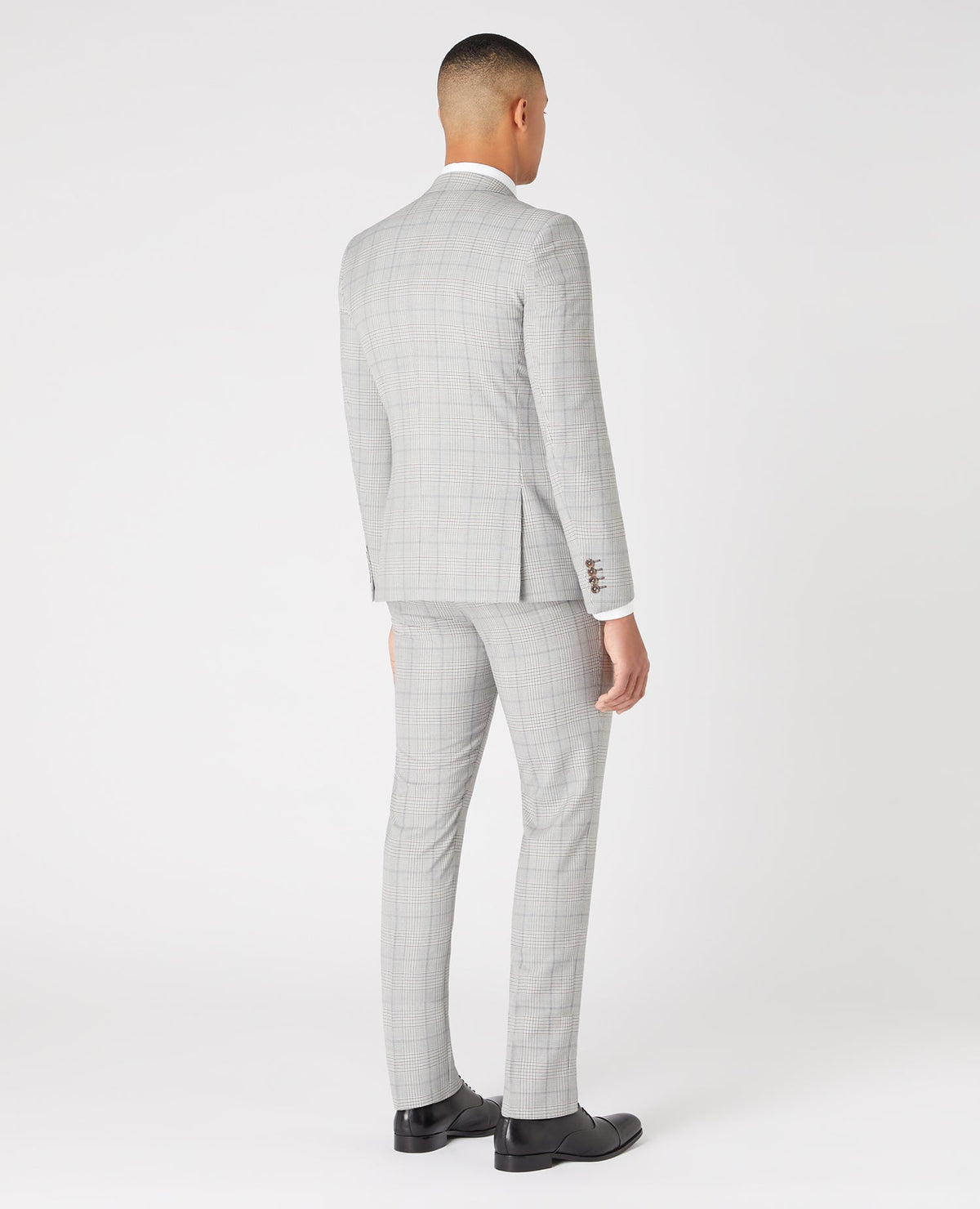 Man wearing a grey X-Slim Mix and Match Suit