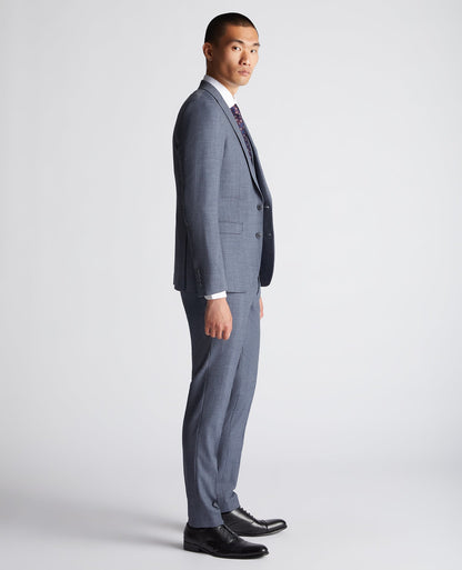 Man wearing a blue X-Slim Fit Wool Blend Mix And Match Suit Jacket