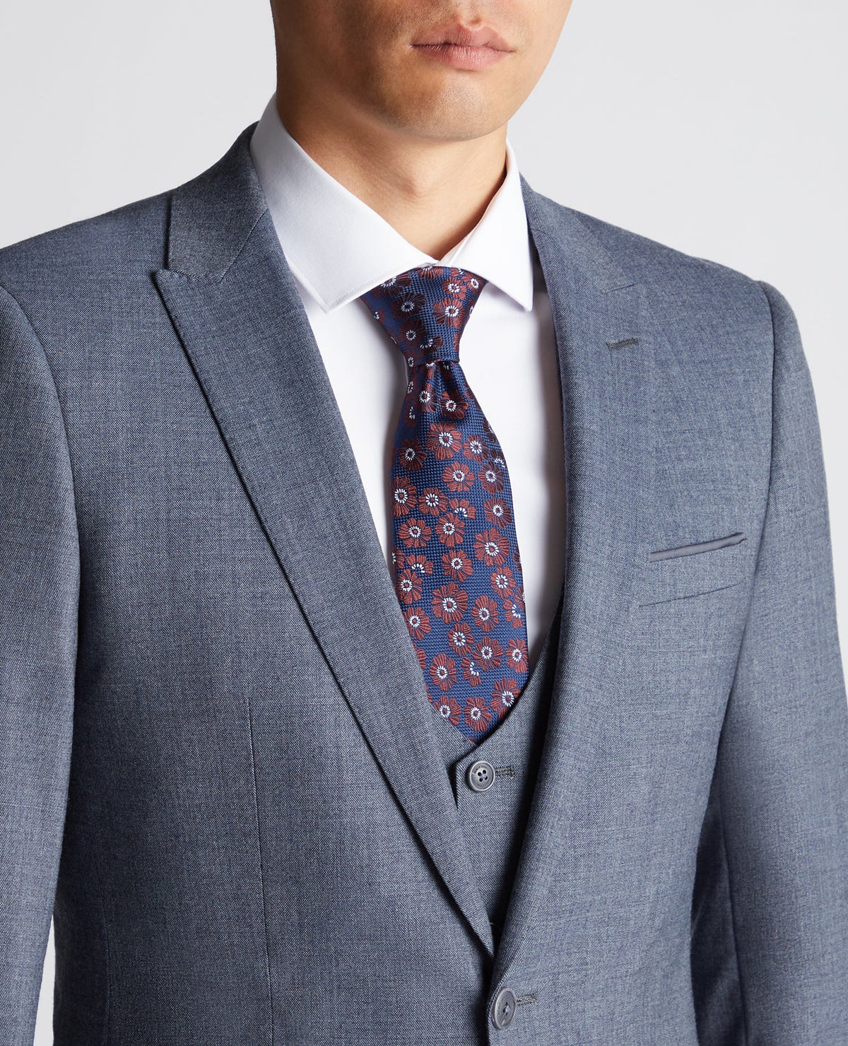 Man wearing a blue X-Slim Fit Wool Blend Mix And Match Suit Jacket