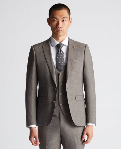 Man wearing a brown X-Slim Fit Wool Blend Mix And Match Suit