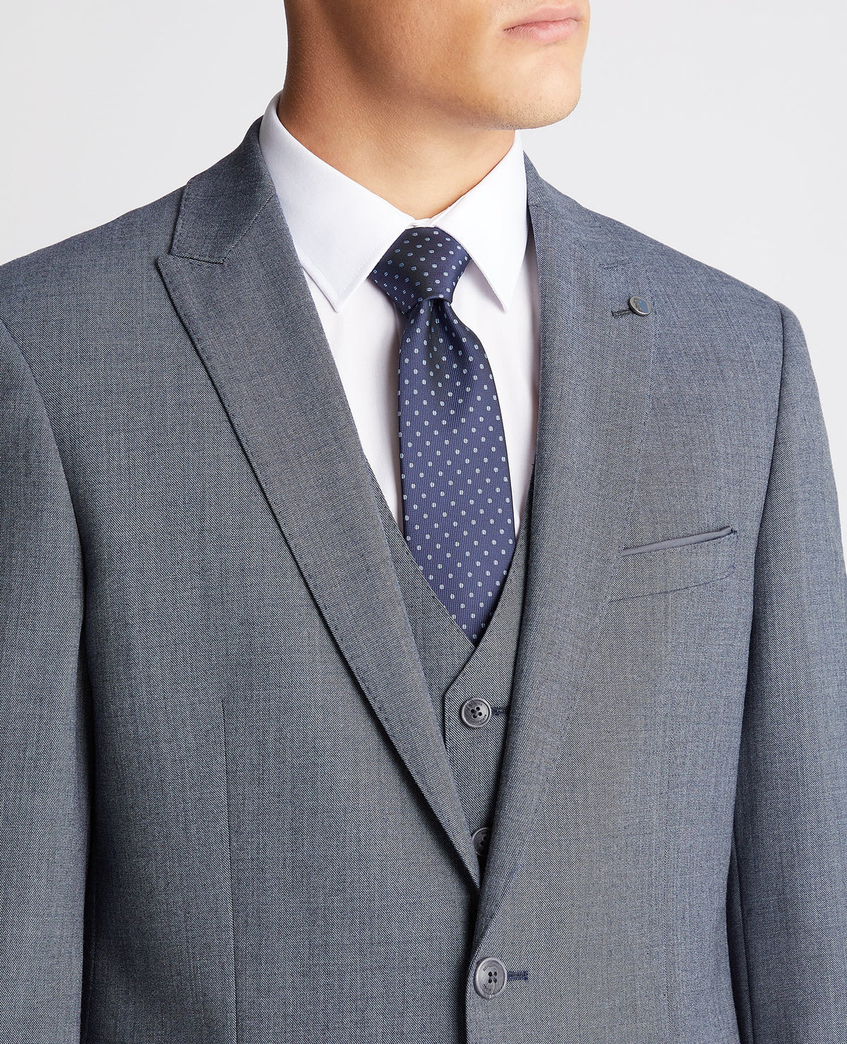 Man wearing a blue Tapered fit wool rich mix and match suit Jacket