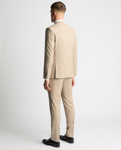 Man wearing a sand Tapered Fit Wool-Stretch Mix and Match Suit Jacket