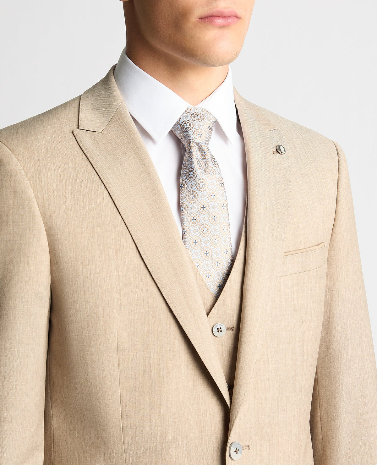 Man wearing a sand Tapered Fit Wool-Stretch Mix and Match Suit Jacket