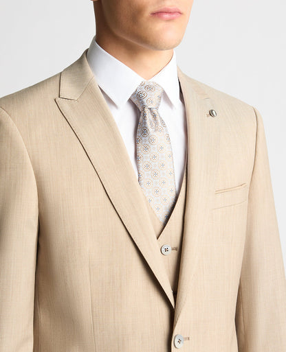 Man wearing a sand Tapered Fit Wool-Stretch Mix and Match Suit Jacket