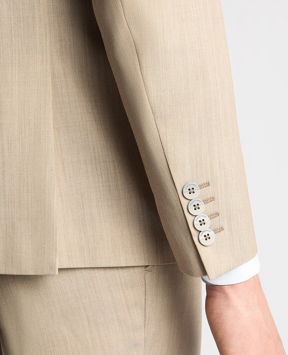 Man wearing a sand Tapered Fit Wool-Stretch Mix and Match Suit Jacket