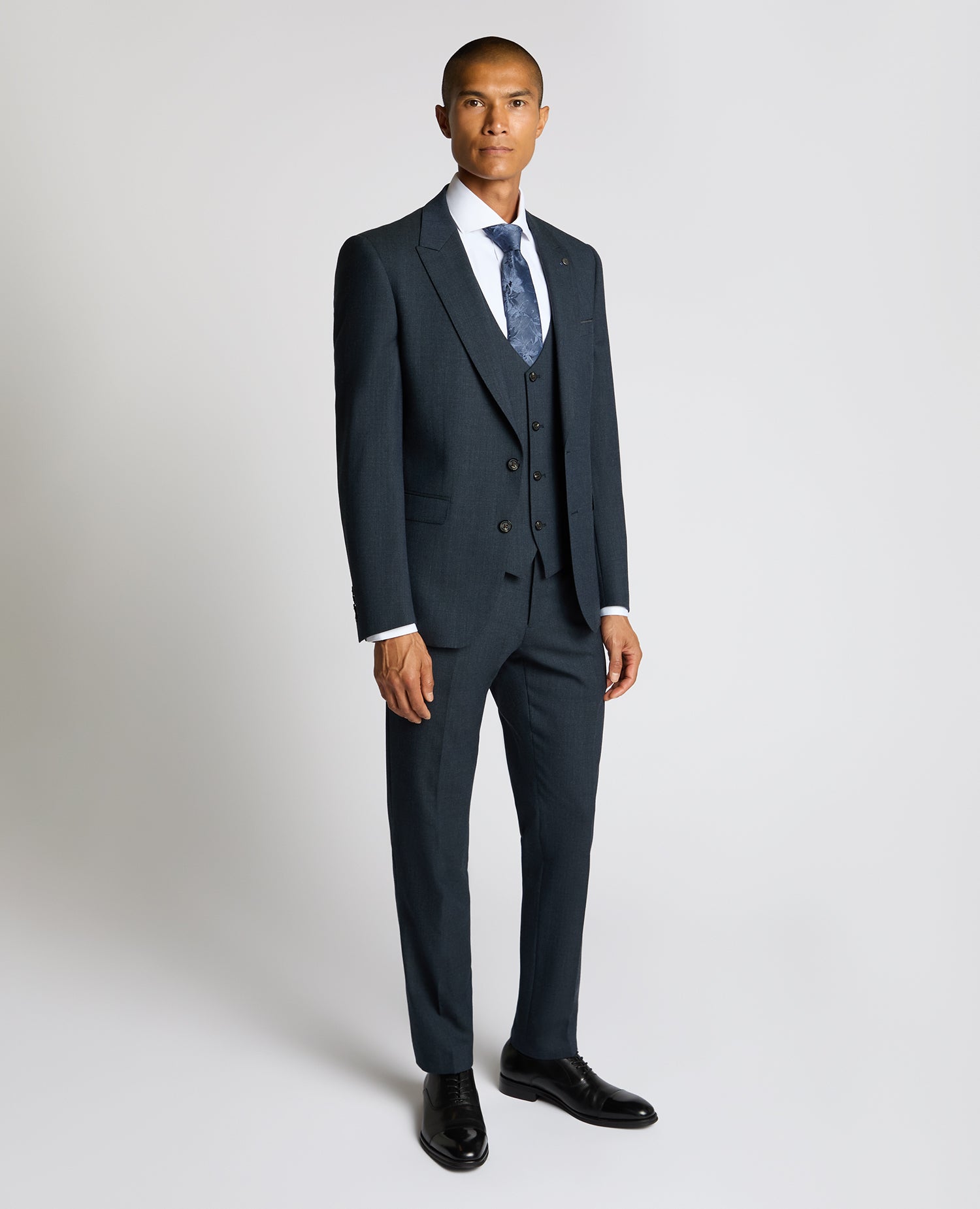 Man wearing a blue Slim Fit Wool Blend Suit