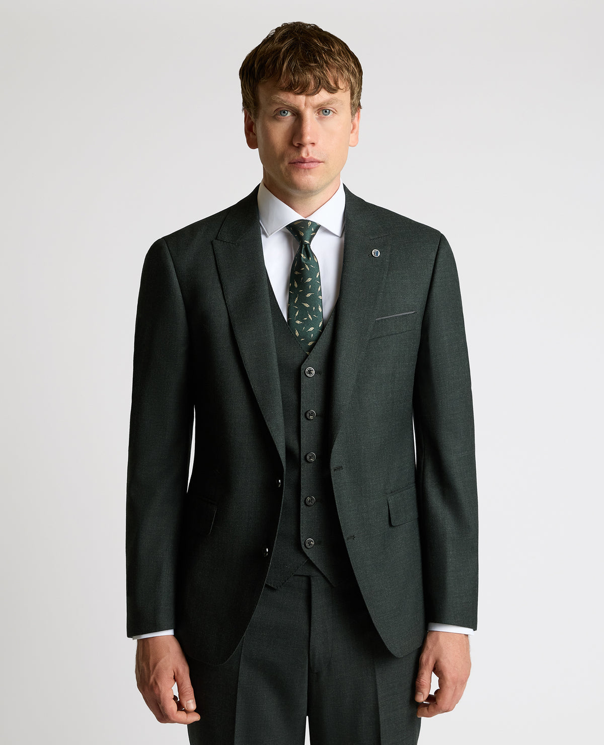 Man wearing a green Tapered Fit Wool Stretch Jacket