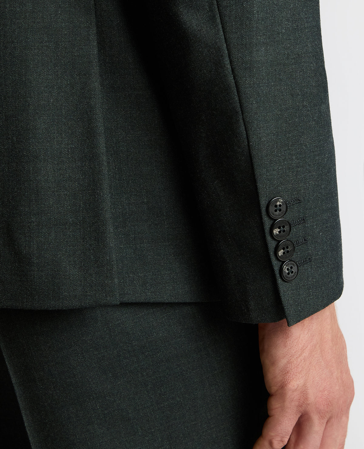 Man wearing a green Tapered Fit Wool Stretch Jacket